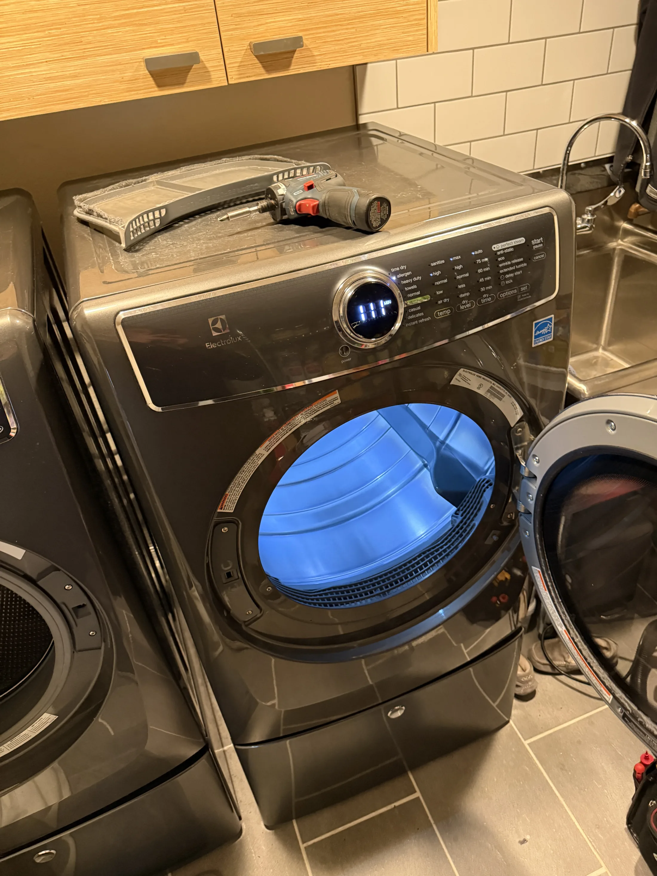 Front-load washer opened during a no-drain service call