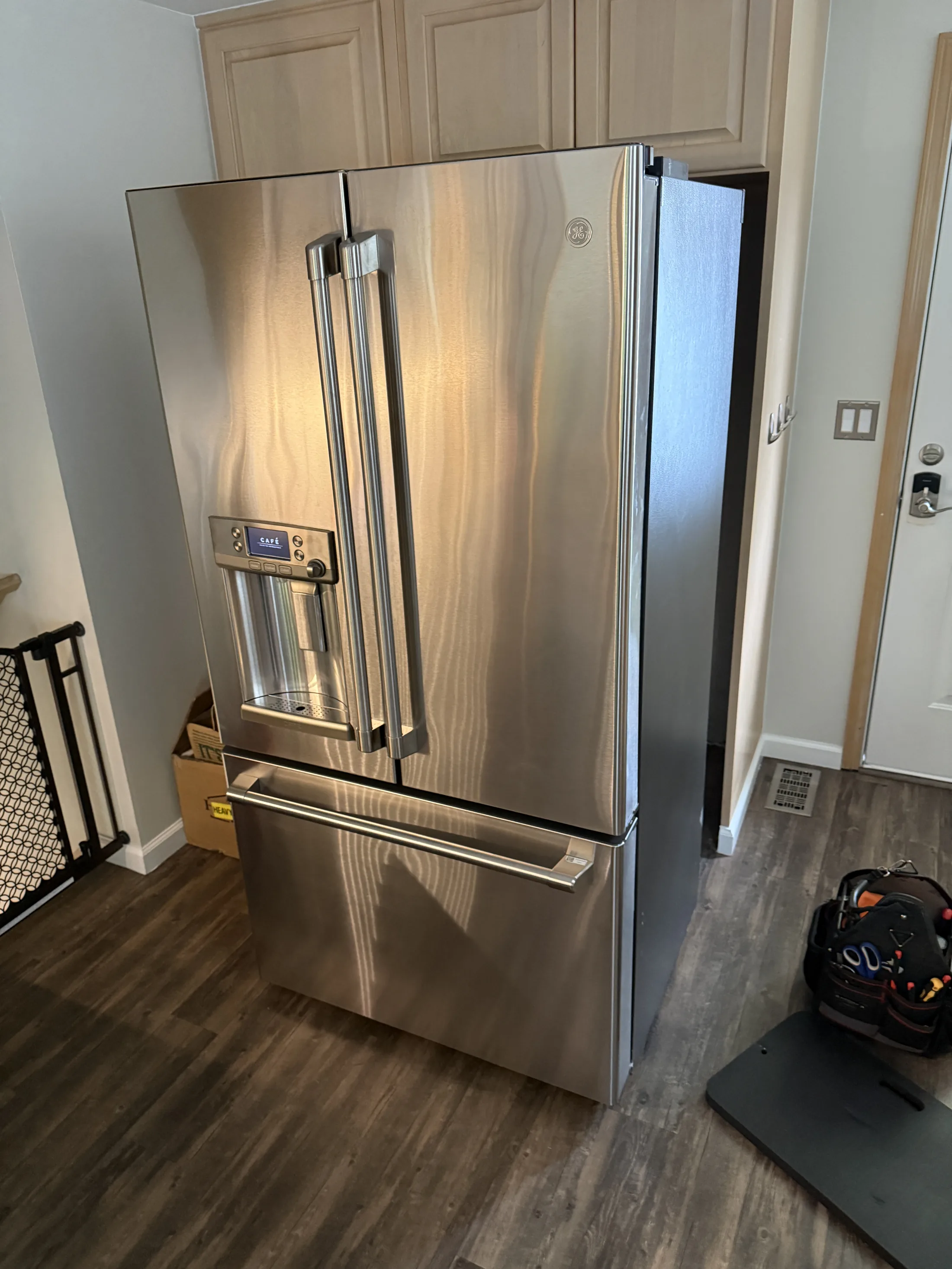 Stainless refrigerator during a Kirkland-area service call